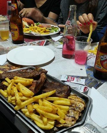 Al Sabor Del Carbon y Algo Mas